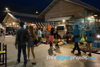 Tourists Walk To Shop At Night Market Srinakarin Road Or Train M… Stock Photo