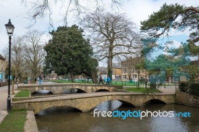 Tourists Wandering Around Bourton-on-the-water Stock Photo