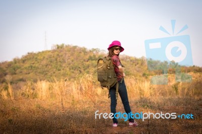 Tourists Woman Are Enjoying The Mountain Stock Photo