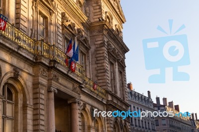 Townhall In Lyon With French Flag Stock Photo