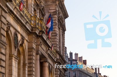 Townhall In Lyon With French Flag Stock Photo