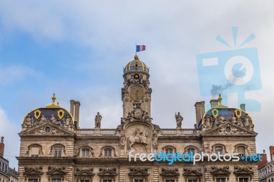 Townhall In Lyon With French Flag Stock Photo