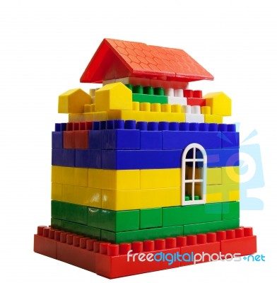 Toy House Out Of Colored Blocks Stock Photo