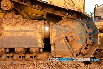 Tractor In Construction Site On Mountain Stock Photo