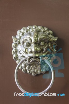 Traditional Chinese Door Handle And Knocker Stock Photo