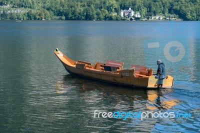 Traditional Flat Bottomed Boat On Lake Hallstatt Stock Photo