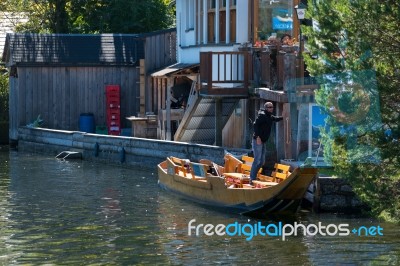 Traditional Flat Bottomed Boat On Lake Hallstatt Stock Photo