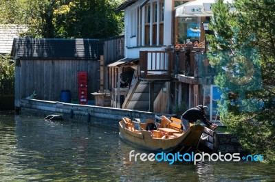 Traditional Flat Bottomed Boat On Lake Hallstatt Stock Photo