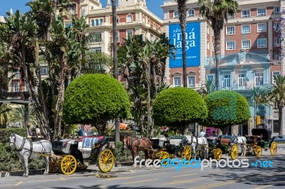 Traditional Horses And Carriages Waiting For Customers In Malaga… Stock Photo