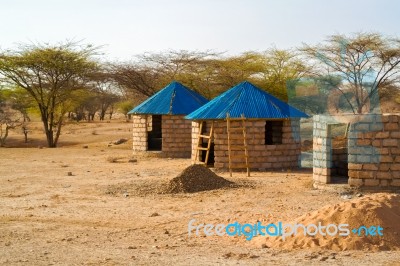 Traditional Houses In Kenya Countryside Stock Photo