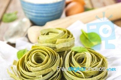 Traditional Italian Raw Homemade Spinach Pasta Stock Photo