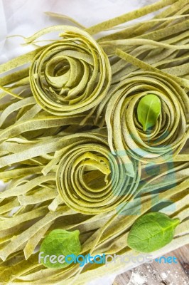 Traditional Italian Raw Homemade Spinach Pasta Stock Photo