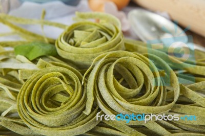 Traditional Italian Raw Homemade Spinach Pasta Stock Photo