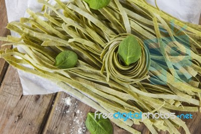 Traditional Italian Raw Homemade Spinach Pasta Stock Photo