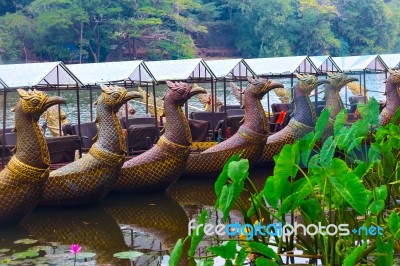 Traditional Khmer Boats With Carved Bows Stock Photo