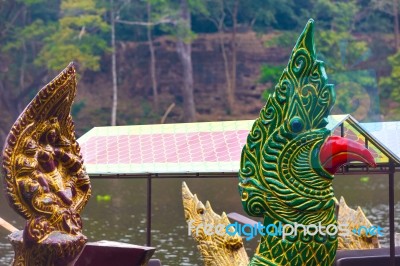 Traditional Khmer Boats With Carved Bows Stock Photo