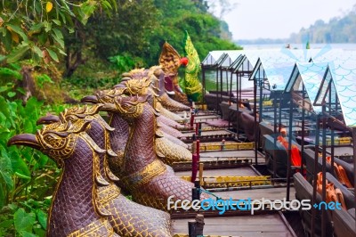 Traditional Khmer Boats With Carved Bows Stock Photo