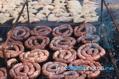 Traditional Meat Grilled On The Grill In The Argentine Countryside Stock Photo