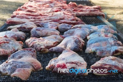 Traditional Meat Grilled On The Grill In The Argentine Countryside Stock Photo