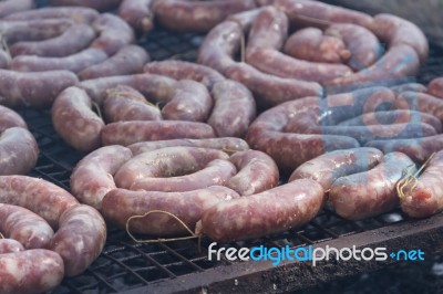 Traditional Meat Grilled On The Grill In The Argentine Countryside Stock Photo