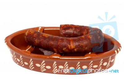 Traditional Portuguese Pottery For Grilling Chorizos Stock Photo