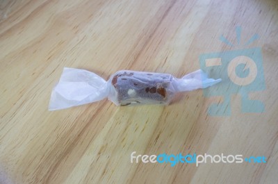 Traditional Soft Caramel Candy In White Wrapped Paper Stock Photo