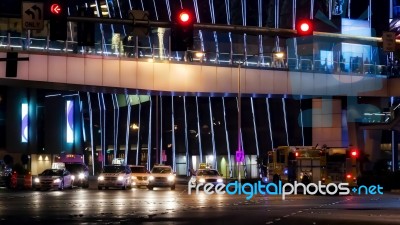 Traffic On The Strip Illuminated At Night In Las Vegas Stock Photo