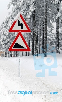 Traffic road sign in frost and snow Stock Photo