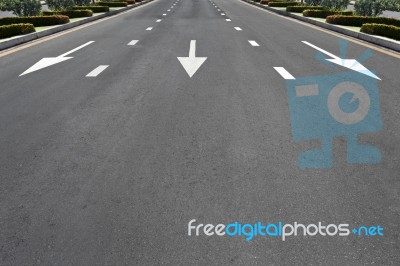 Traffic Symbol On Surface Road Stock Photo