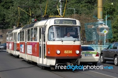 Tram Crossing The Cechuv Bridge In Prague Stock Photo