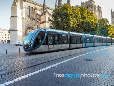 Tram Passing The Cathedral Of St Andrew In Bordeaux Stock Photo