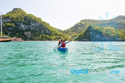 Travel By Boat With A Kayak Stock Photo