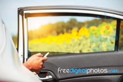 Travelers Checks Mobile Phones On Car Stock Photo