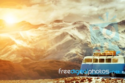 Traveling Car Parking On Road Side Against Beautiful Snow Mountain Background Stock Photo