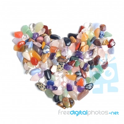 Treasure Stone Heart On A White Background Stock Photo