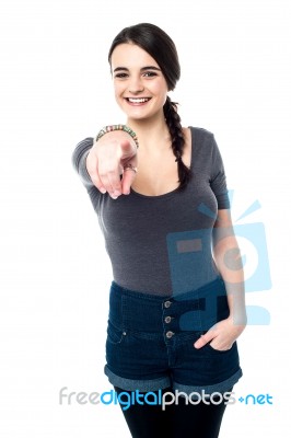 Trendy Teenager Pointing You Out Stock Photo