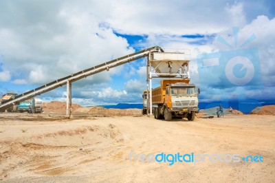 Truck Loading Gravel In Tabnzania Stock Photo