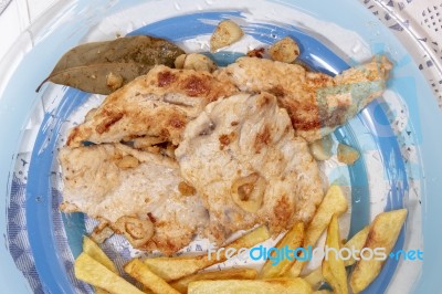 Turkey Steak With French Fries Stock Photo