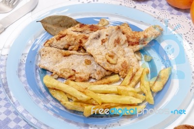 Turkey Steak With French Fries Stock Photo