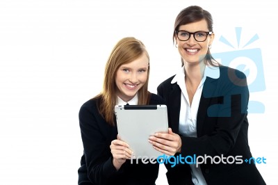 Tutor With Student Holding Portable Tablet Pc Stock Photo