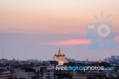 Twilight Time : The Golden Mount At Wat Sraket Rajavaravihara Te… Stock Photo