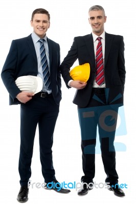 Two Architects Posing With Safety Helmet Stock Photo