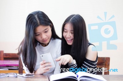 Two Asia Thai High School Student Uniform Best Friends Beautiful Girl Reading Book Stock Photo