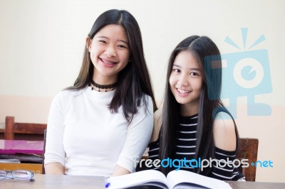 Two Asia Thai High School Student Uniform Best Friends Beautiful Girl Reading Book Stock Photo