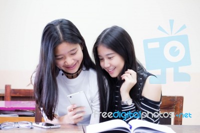 Two Asia Thai High School Student Uniform Best Friends Beautiful Girl Reading Book Stock Photo