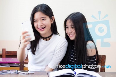 Two Asia Thai High School Student Uniform Best Friends Beautiful Girl Reading Book Stock Photo