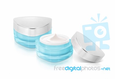 Two Blue Triangle Cosmetic Jar On White Background Stock Photo