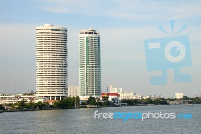 Two Business Building On Curve Water Front Stock Photo