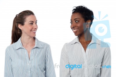 Two Business Women Looking At Each Other Stock Photo