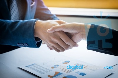 Two Businessman Shaking Hands During A Meeting In The Office, Su… Stock Photo